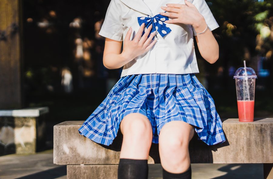 School dress codes disproportionately target young women, causing discomfort. Photo by Chen Feng