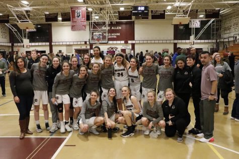 The Canton girls basketball team posed for a group shot at Buckley High School after the semifinals game against Northwest Catholic./Kellie Pesino