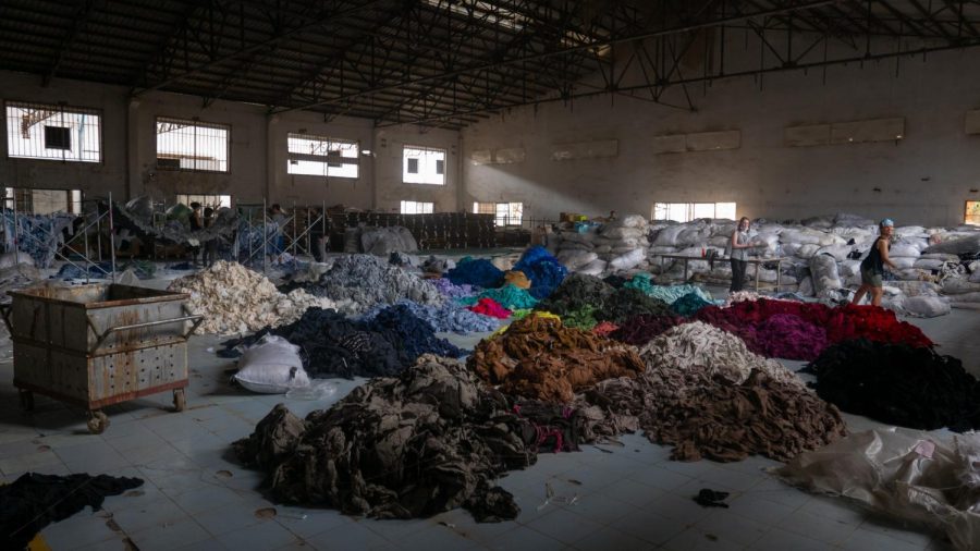 Abandoned clothing  found in Cambodian factory that was eventually used in a political art piece by Clothing the Loop.
Francois Le Nguyen/unsplash
