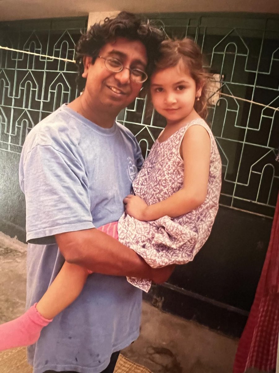 The author as a child with her father